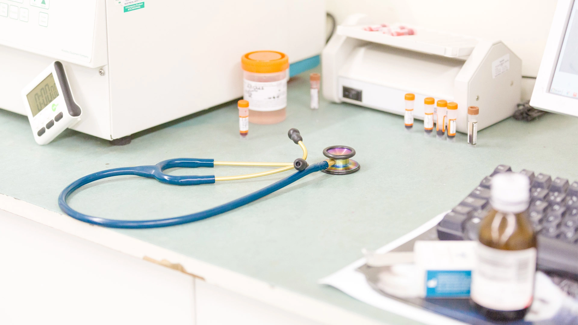 stethoscope and medication bottles 