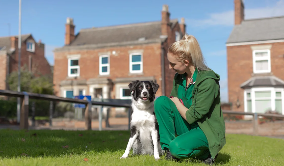dog and nurse outside Grantham's surgery
