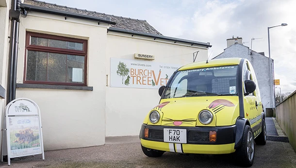 yellow veterinary vehicle