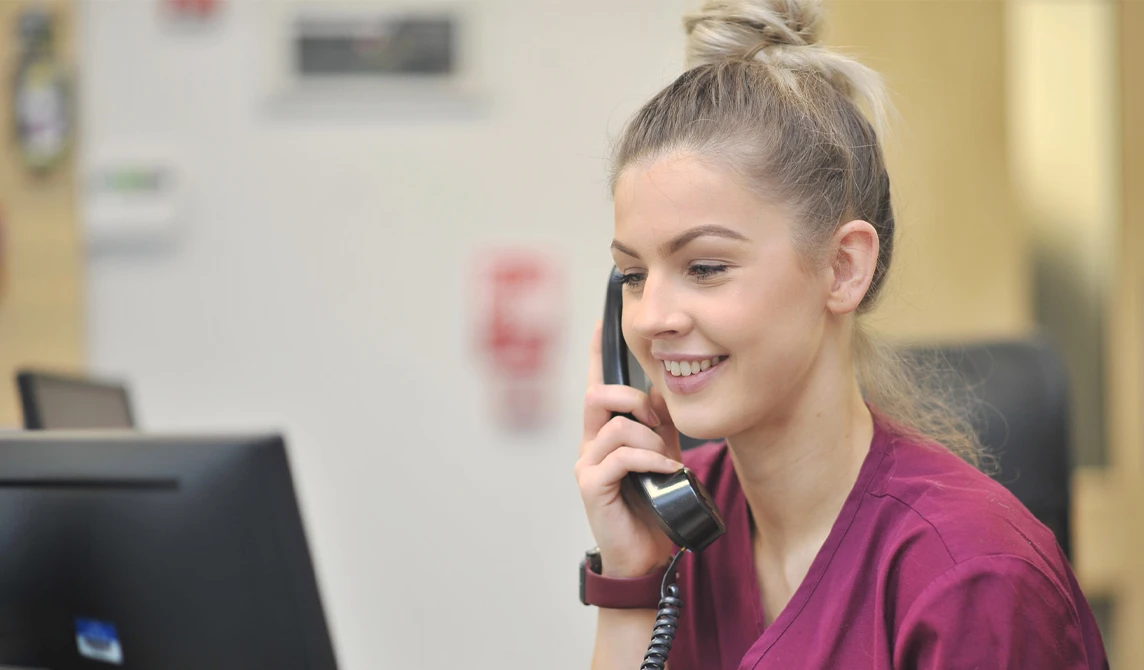 Receptionist on the phone