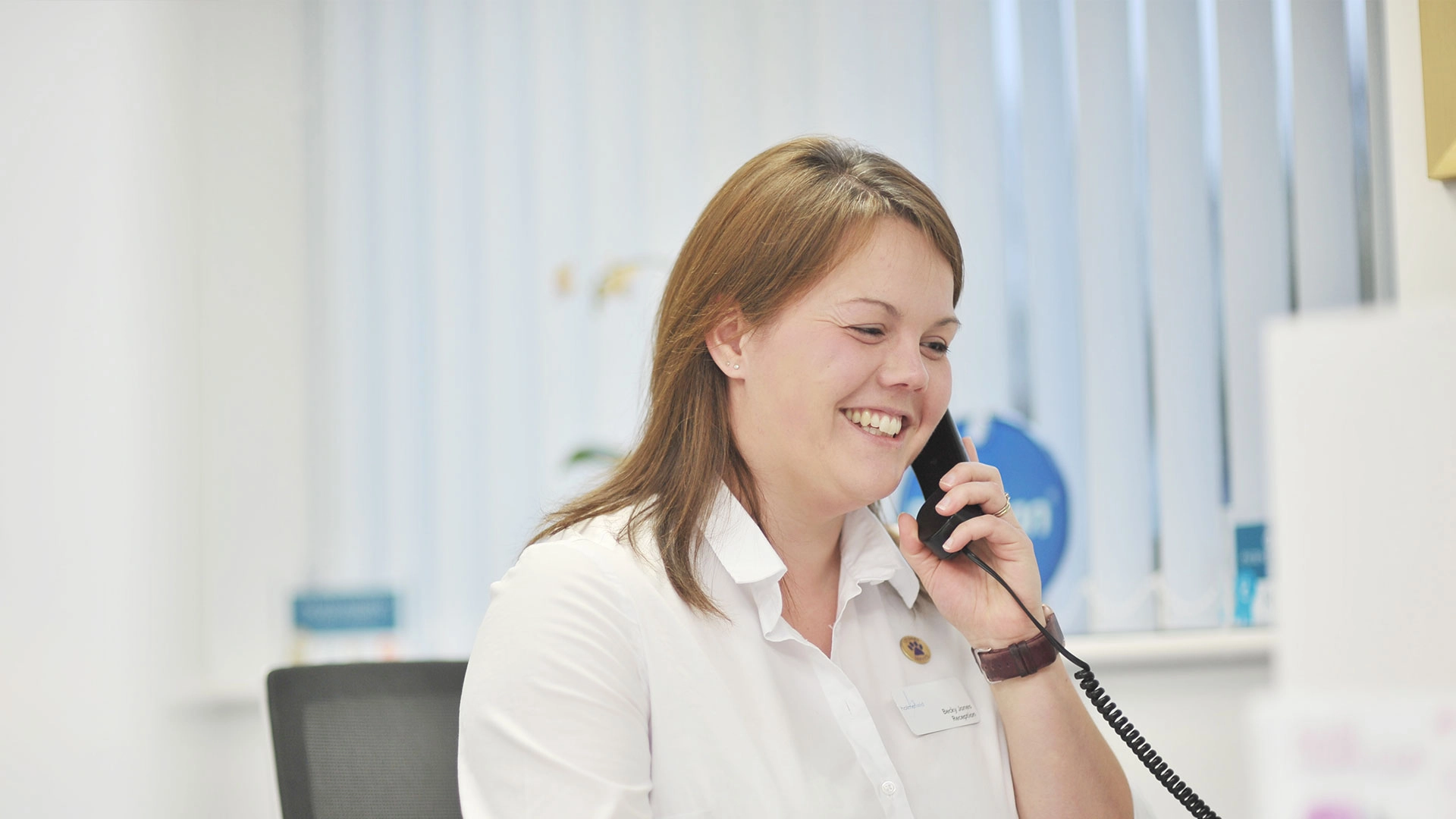 Female receptionist on phone