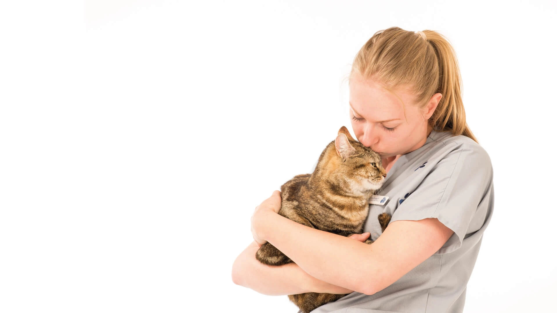 cat with nurse hug